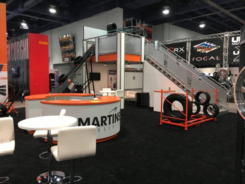 Stairs On The Ends of A Trade Show Double Deck Design