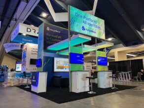 Trade-Show-Island-Display-With-Backlit-Graphics-Open-Floor-Space-Exhibit-Design-Flat-Screen-Trade-Show-Workstations-20-Trade-Show-Lounge-Area